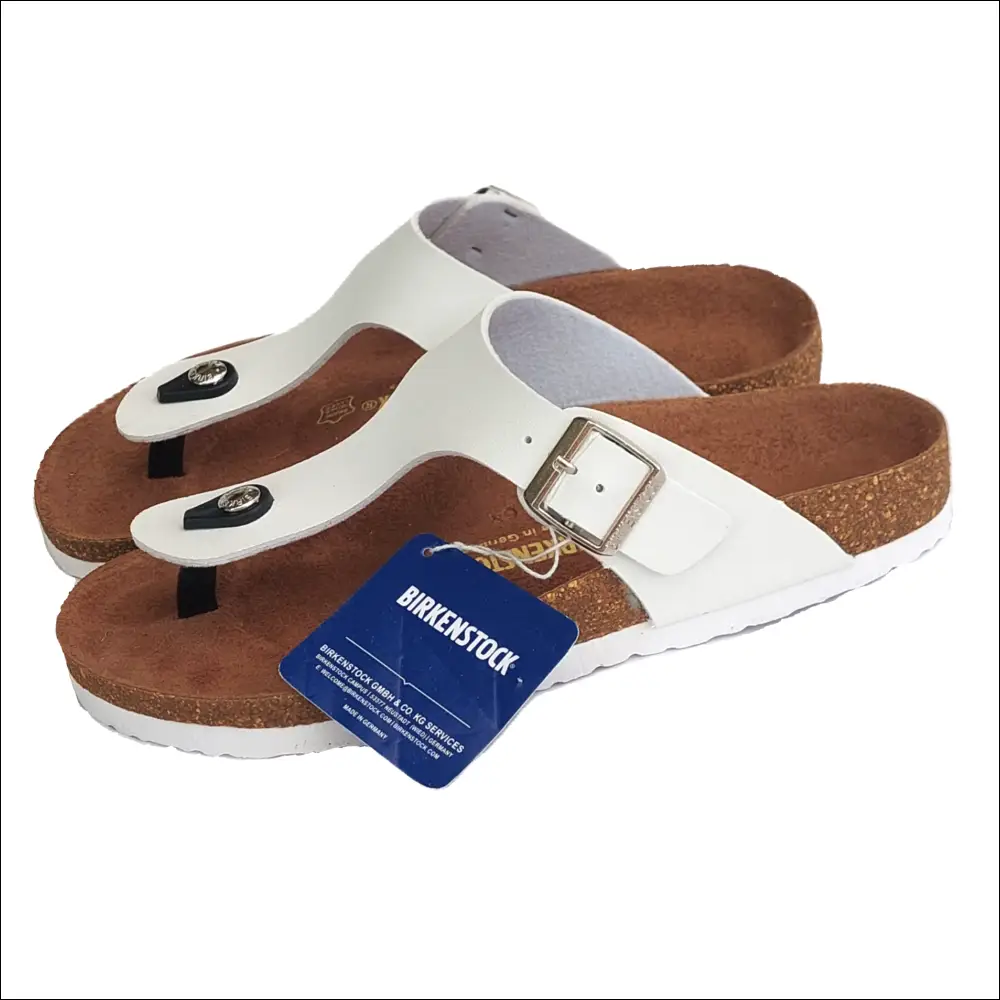 Birkenstock Gizeh White flip-flops with ergonomic cork sole and modern design.