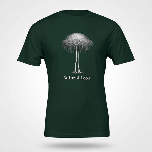Birch Trees in Heels – Surrealism Art Tee med texten Natural Look på en mörkgrön t-shirt.