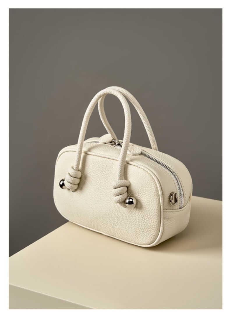 Modern Leather Handbag with Twisty Design