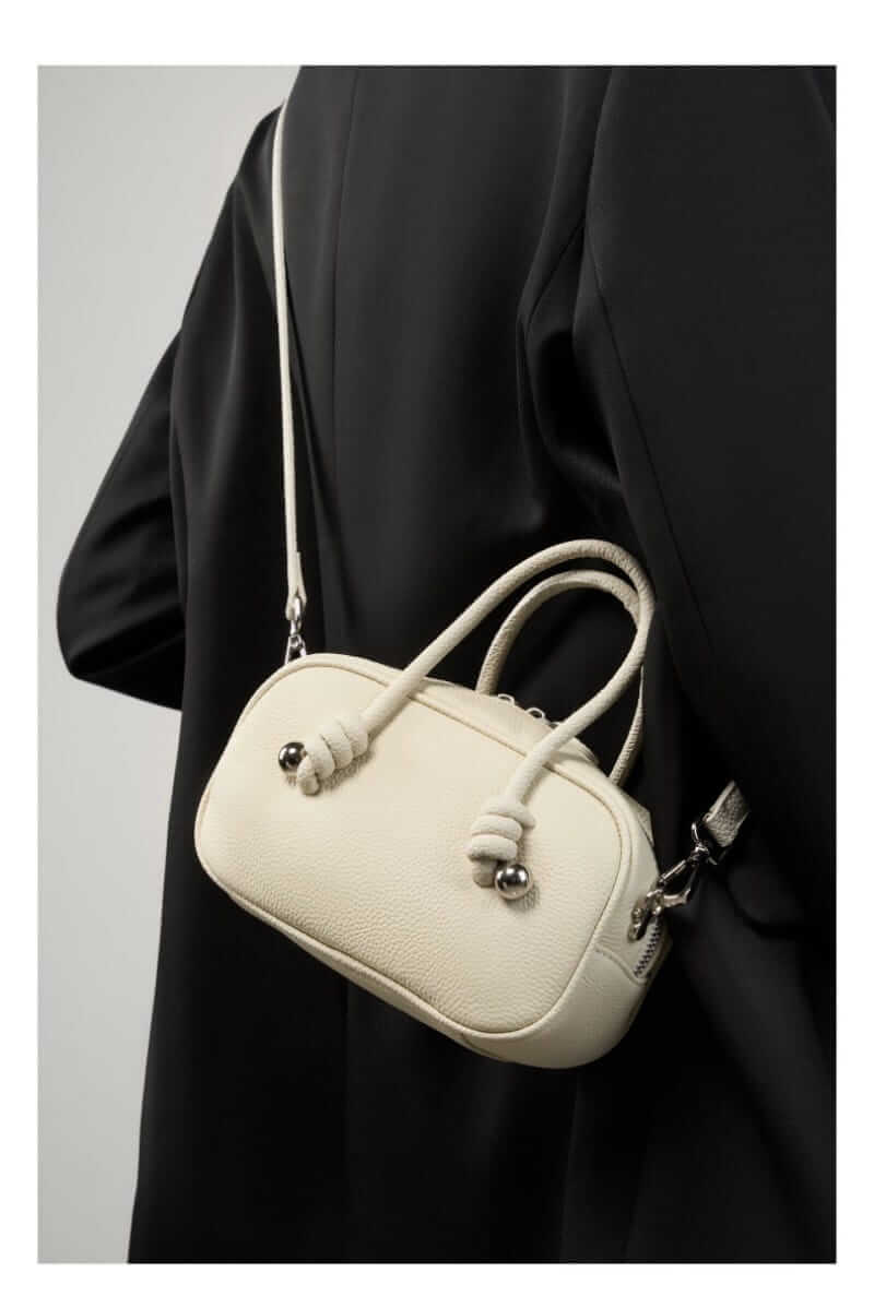 Modern Leather Handbag with Twisty Design
