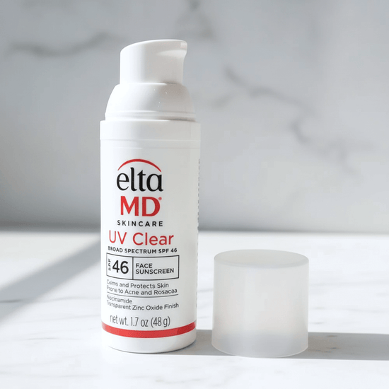EltaMD UV Clear Broad Spectrum SPF 46 sunscreen bottle on a marble background, designed for sensitive skin.