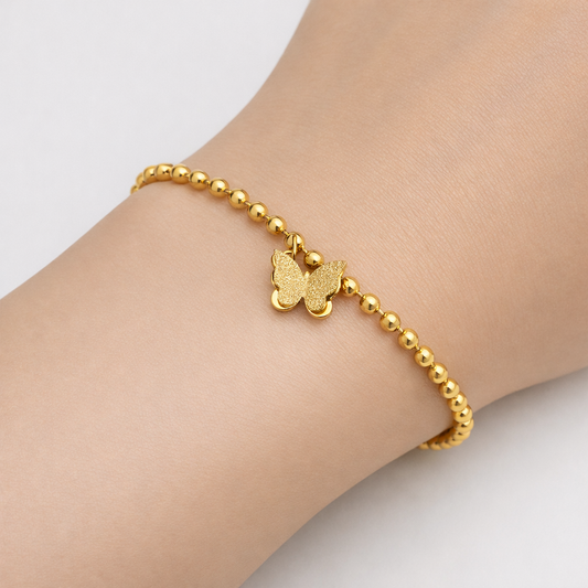 Guldfärgat Armband – Road of Pearls and Wings med 3D Fjäril