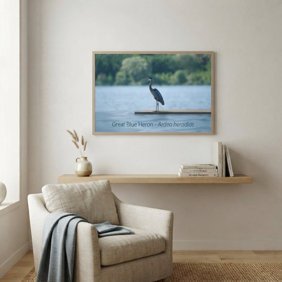 Great Blue Heron standing by the water's edge in a serene home setting with natural decor.