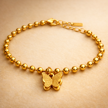 Guldfärgat Armband – Road of Pearls and Wings med 3D Fjäril