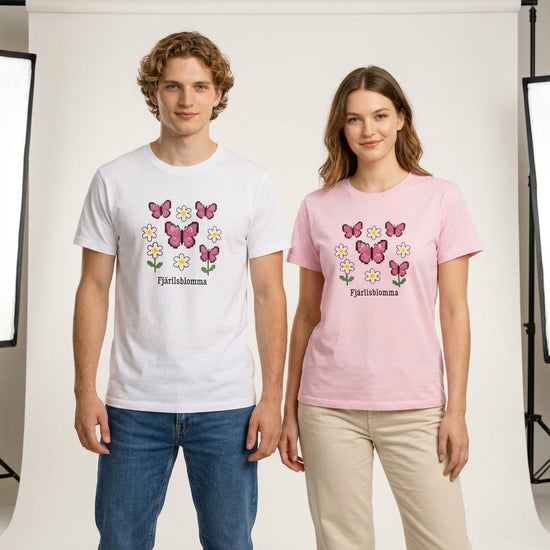 Fjärilsblomma t-shirt i vitt och rosa med blommor och fjärilar, minimalistisk stil för somriga outfits.