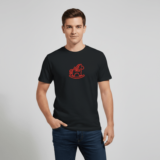 Dalarna Red Rocking Horse T‑Shirt | Swedish Design Classic modeled by a man in a black t-shirt with a red rocking horse print.