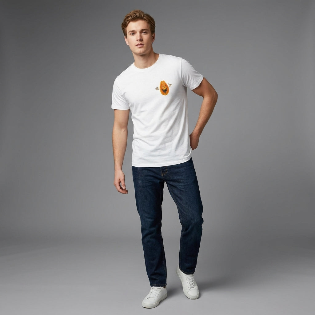 Sustainable Papaya Icon Crew Neck T-Shirt – Eco-Friendly Recycled Cotton Tee, man i vit t-shirt med papaya-tryck och blå jeans.