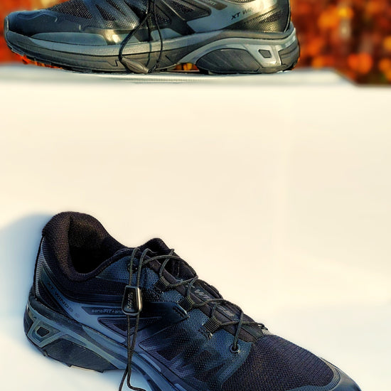 “Salomon XT-Wings 2 Black Magnet löparskor i höstmiljö