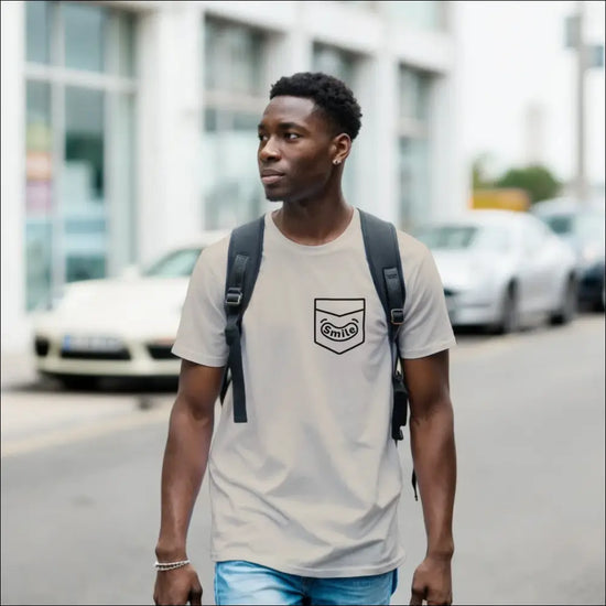 Smiling Pocket Classic Unisex Crewneck T-shirt | Premium Cotton Blend for DTG Printing worn by a man walking in the city