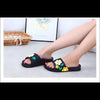 Sommarens favorit: Svarta sandaler med blomsterdesign - Sandaler dam