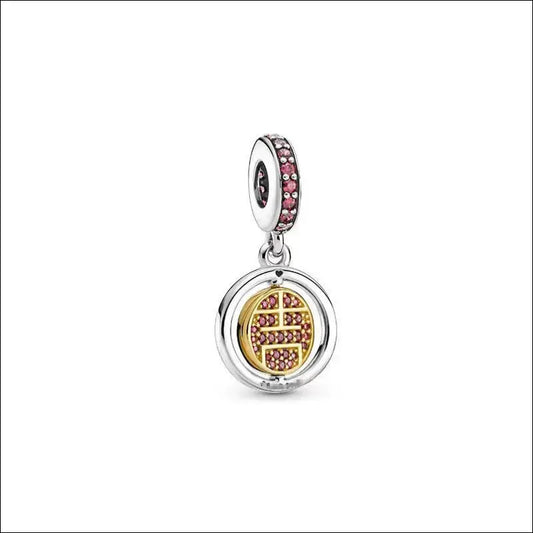 Spinning Lucky Charm – Pandora Style i Guld 769282C01